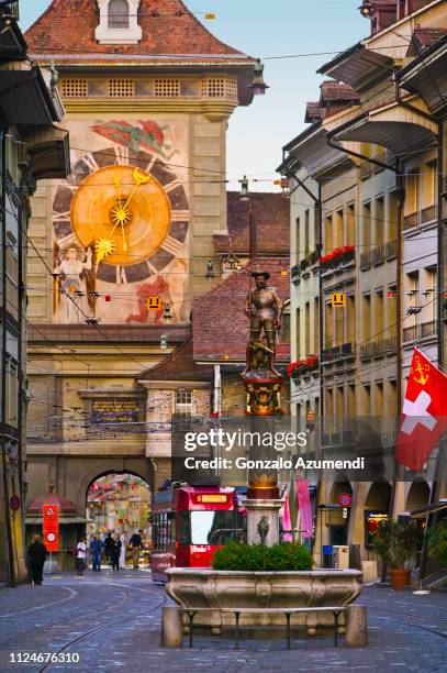 markgasse street and clock tower in bern - bern clock tower stock pictures, royalty-free photos & images