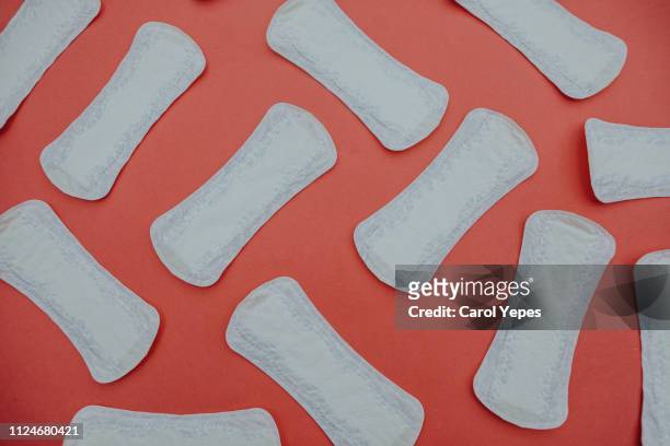 sanitary pad background in pink - sports period stock pictures, royalty-free photos & images