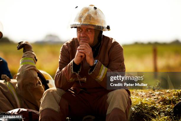 firemen training, firemen taking a break at training facility - international firefighters day stock pictures, royalty-free photos & images