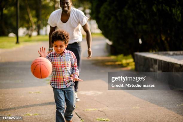 father and son. - national day of belgium 2017 stock pictures, royalty-free photos & images