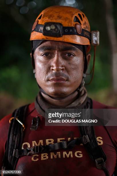 Minas Gerais Military Firefighter Vinicius Expedito de Brito e Silva poses for a portrait after leaving the core searching area where he is working,...