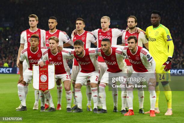 The Ajax team pose for a team photo prior to the UEFA Champions League Round of 16 First Leg match between Ajax and Real Madrid at Johan Cruyff Arena...