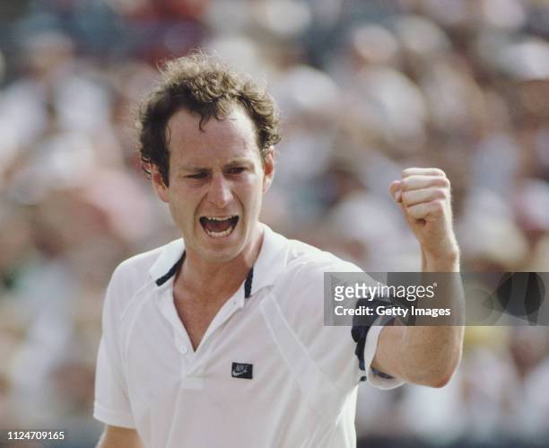 John McEnroe of the United States pumps his fist during the Men's Singles Semi final match against Mats Wilanderat the US Open Tennis Championship on...