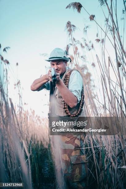 traditional hunter ready to shoot - hobby bird of prey stock pictures, royalty-free photos & images