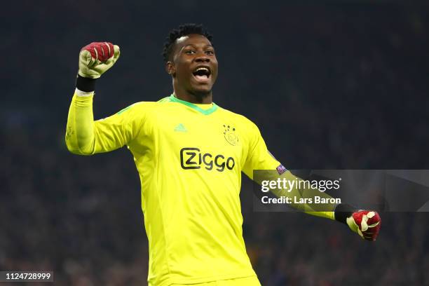 Andre Onana of Ajax celebrates after scoring his team's first goal during the UEFA Champions League Round of 16 First Leg match between Ajax and Real...