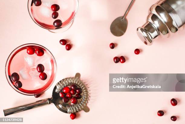 cranberry cocktail and cocktail making equipment - cranberries stock pictures, royalty-free photos & images