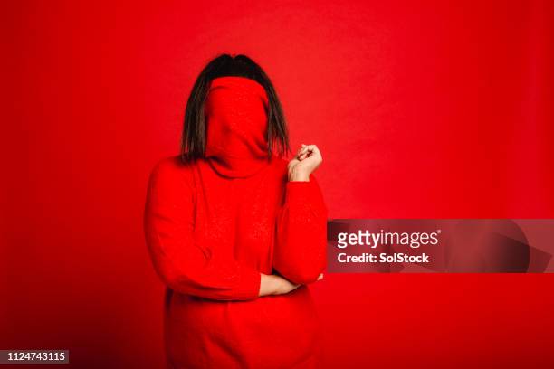 hiding in plain sight - shy stock pictures, royalty-free photos & images