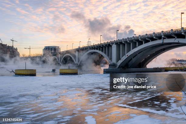 sunrise, central avenue bridge, minneapolis, minnesota, america - minneapolis winter stock pictures, royalty-free photos & images