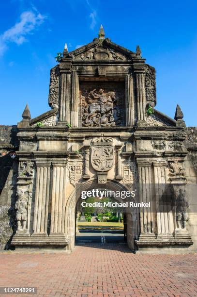 entrance to the old fort santiago, intramuros, manila, luzon, philippines - fort santiago manila stock pictures, royalty-free photos & images