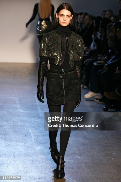 Model Marina Peres walks the runway wearing the Phi Fall 2009 during ...