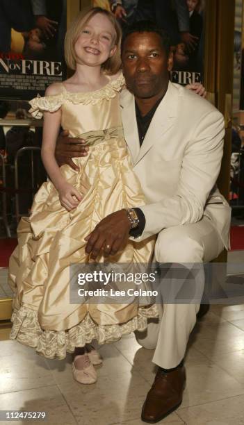 Dakota Fanning and Denzel Washington during "Man on Fire" - Los Angeles Premiere - Red Carpet at Mann Village Westwood in Westwood, California,...