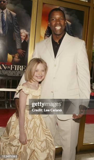 Dakota Fanning and Denzel Washington during "Man on Fire" - Los Angeles Premiere - Red Carpet at Mann Village Westwood in Westwood, California,...