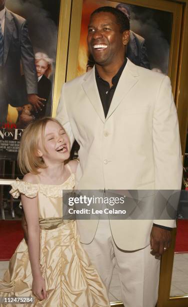 Dakota Fanning and Denzel Washington during "Man on Fire" - Los Angeles Premiere - Red Carpet at Mann Village Westwood in Westwood, California,...