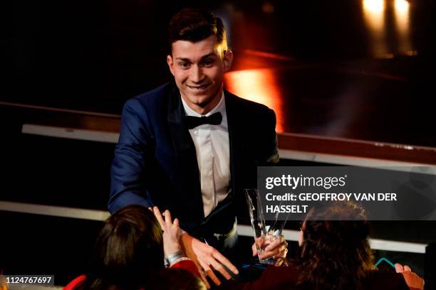 French Classical guitar virtuoso, Thibaut Garcia receives a trophy during the "Victoire de la musique classique" award ceremony at The Seine Musicale...