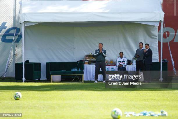 Gerardo Martino head coach of Mexico's National team, Guillermo Cantu, Gerardo Torrado and Mariano Varela watch the players during a visit to FC...