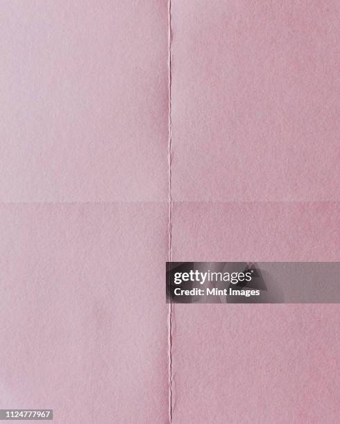 Folded Coloured Paper Photos and Premium High Res Pictures - Getty Images