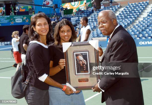 Jeanne Moutoussamy Ashe, Camera Ashe and Henry A. Pankey, vice president, Emergency Preparedness of the United States Postal Service