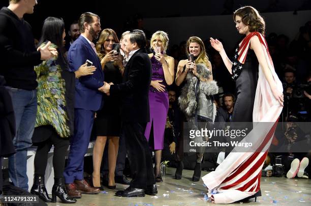 Designer Zang Toi greets Donald Trump Jr. At the Zang Toi front row during New York Fashion Week: The Shows at Gallery II at Spring Studios on...