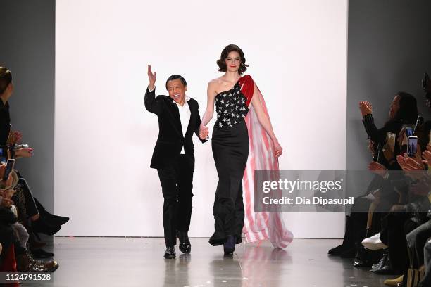 Designer Zang Toi walks the runway for the Zang Toi fashion show during New York Fashion Week: The Shows at Gallery II at Spring Studios on February...