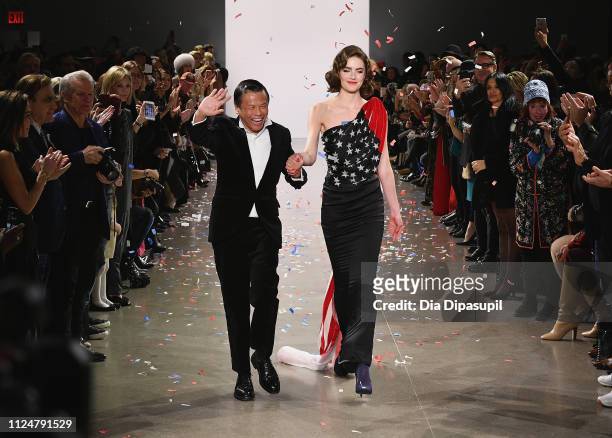 Designer Zang Toi walks the runway for the Zang Toi fashion show during New York Fashion Week: The Shows at Gallery II at Spring Studios on February...