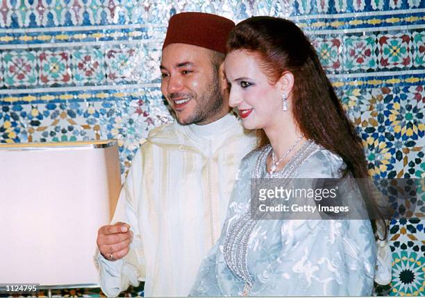 Morocco's King Mohammed VI, and his commoner bride-to-be Salma Bennani are seen in an undated file photo. King Mohammed VI and Bennani are to wed in...