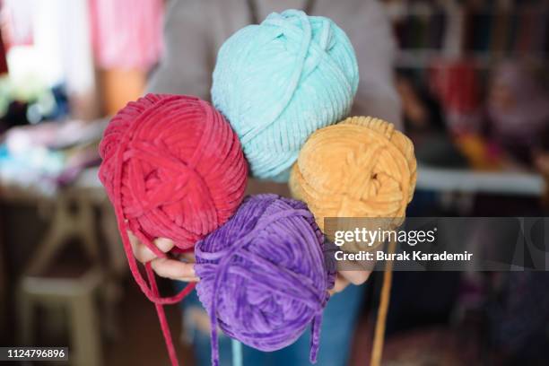 colorful wool balls in hands of young woman - sheep sales stock pictures, royalty-free photos & images