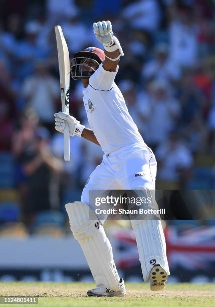 Shane Dowrich of West Indies celebrates reaching his 100 during Day Three of the First Test match between England and West Indies at Kensington Oval...