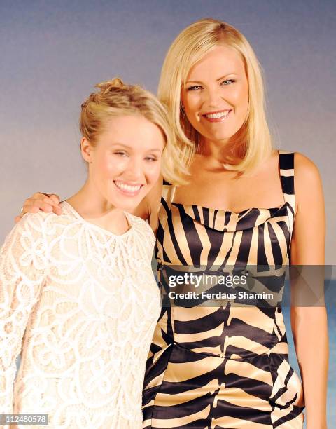 Kirsten Bell and Malin Akerman attend a photocall to promote 'Couples Retreat' on October 15, 2009 in London, England.