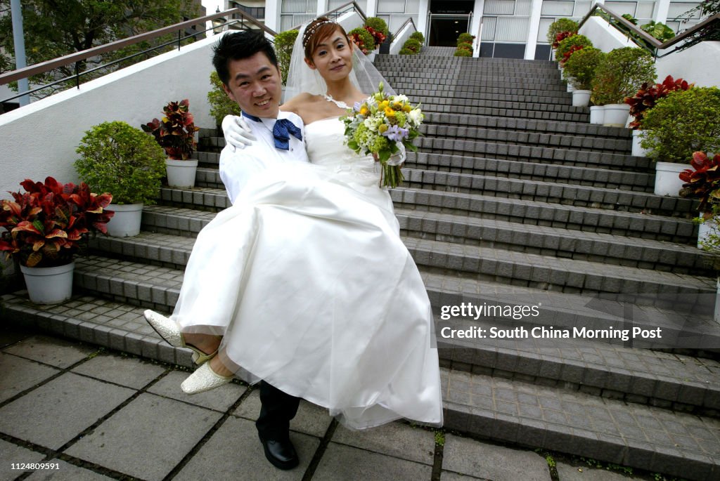 Lau Wei-kit and Phyllis Wong Shan-shan marry in City Hall. 29 February 2004