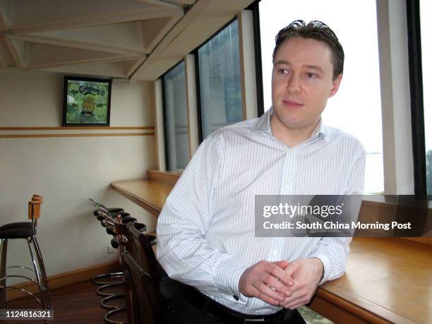 Bar manager at Mes Amis, Christian Moore, at Open Kitchen, Wan Chai. 15 April 2004