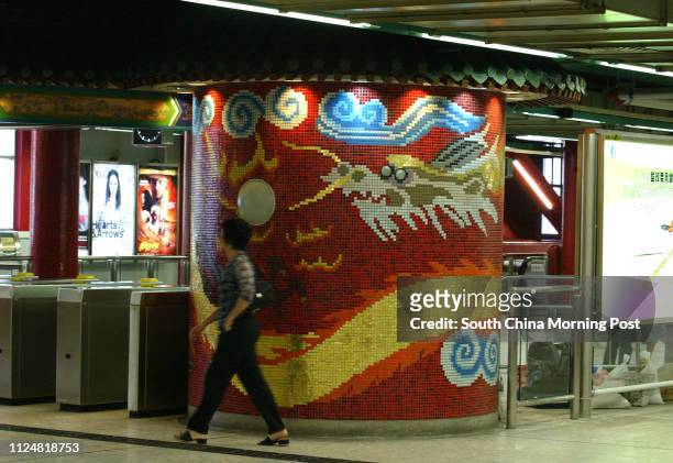 Old style tile dragon covered column in the Tsuen Wan MTR Station that are to be demolished and rebuilt along modern lines promting an outcry from...