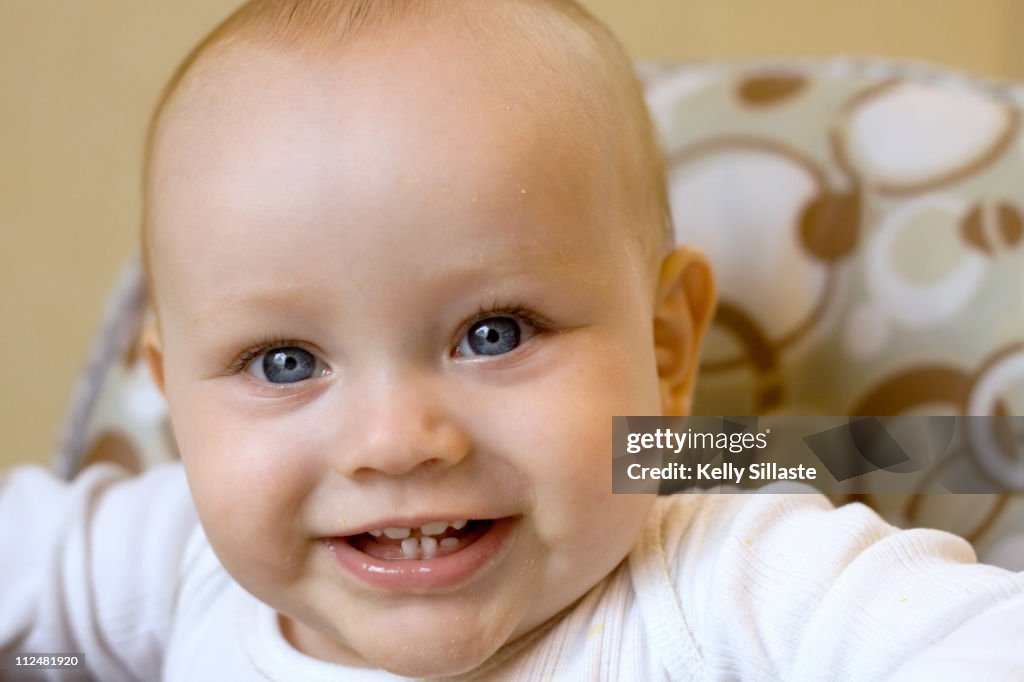 A Happy Month Old Boy In Highchair High-Res Stock Photo Getty