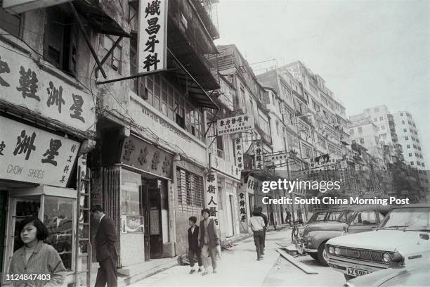 The Kowloon Walled City -- a maze of dilapidated buildings in Kowloon City. 26DEC72