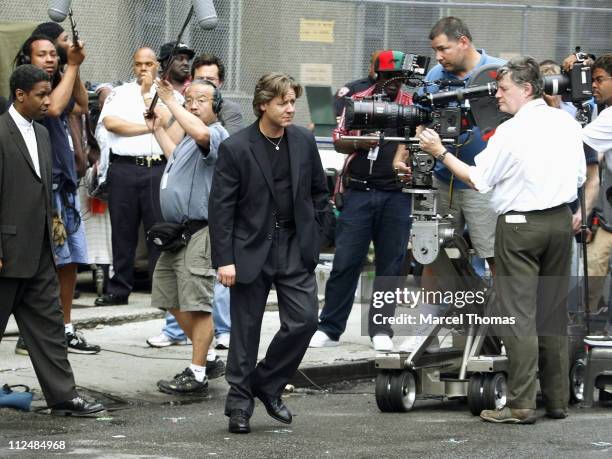 Denzel Washington and Russell Crowe during Denzel Washington and Russell Crowe on the set "American Gangster" - September 16, 2006 at Lower Manhattan...