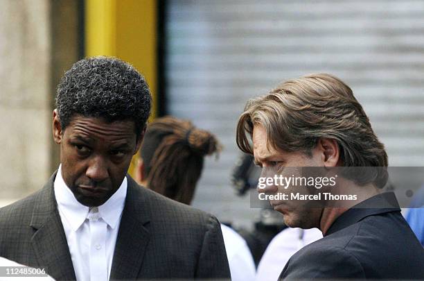 Denzel Washington and Russell Crowe during Denzel Washington and Russell Crowe on the set "American Gangster" - September 16, 2006 at Lower Manhattan...