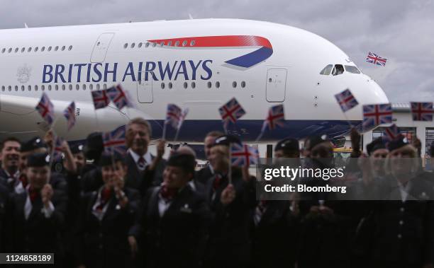 British Union flag flies from the cockpit of a new Airbus A380 aircraft operated by British Airways after landing at Heathrow airport in London,...