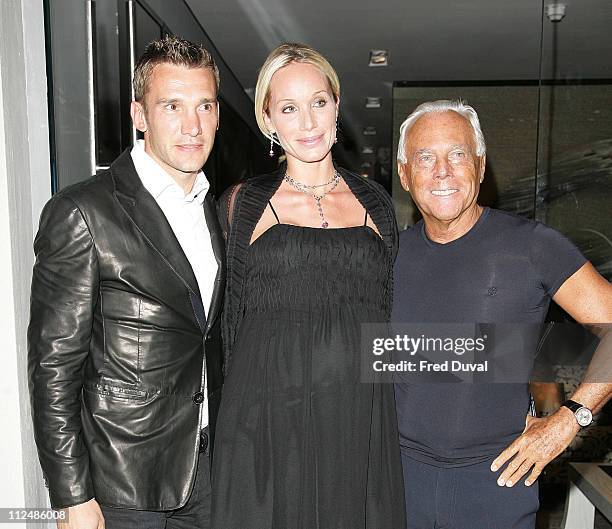 Giorgio Armani with Chelsea football player Andriy Shevchenko and his model wife Kristen Pazik