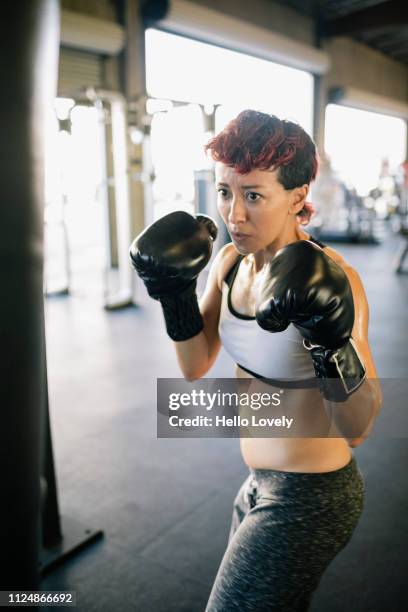 Athlete hitting punching bag