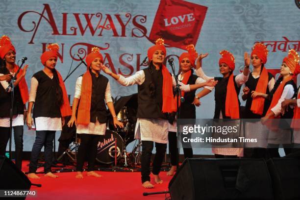Youngsters perform a cultural programme during a drive to increase awareness about condoms as a contraceptive method, at Shivaji Maidan in Jambli...