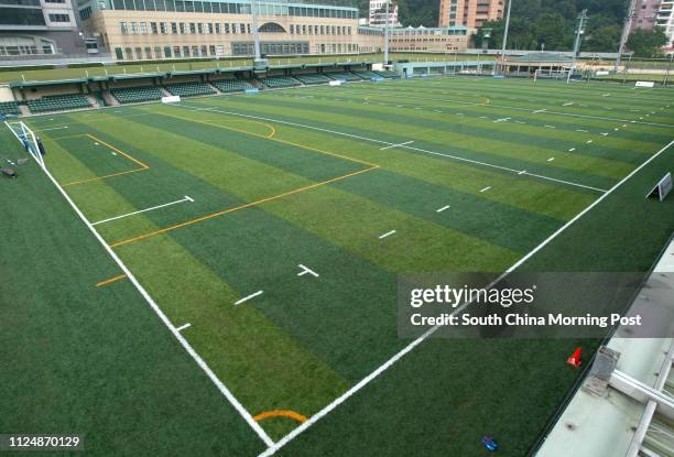 Take pix of new artificial pitch at HK Football Club, Sports Road. 11 October 2004.