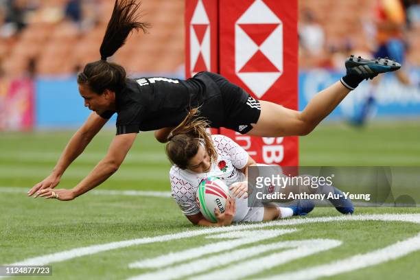 Helena Rowland of England scores a try against Ruby Tui of the Black Ferns Sevens during day one of the 2019 Hamilton Sevens at FMG Stadium on...
