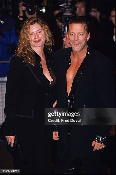 Mickey Rourke and Carrie Otis during Mickey Rourke and Carrie Otis Sighting - November 1, 1995 at London in London, United Kingdom.