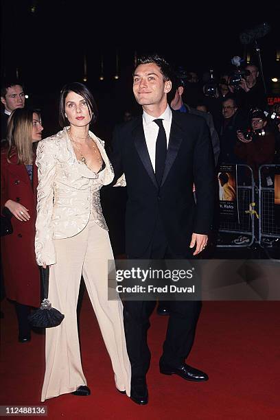 Sadie Frost and Jude Law during The Talented Mr Ripley London Premiere at Leicester Square in London, United Kingdom.