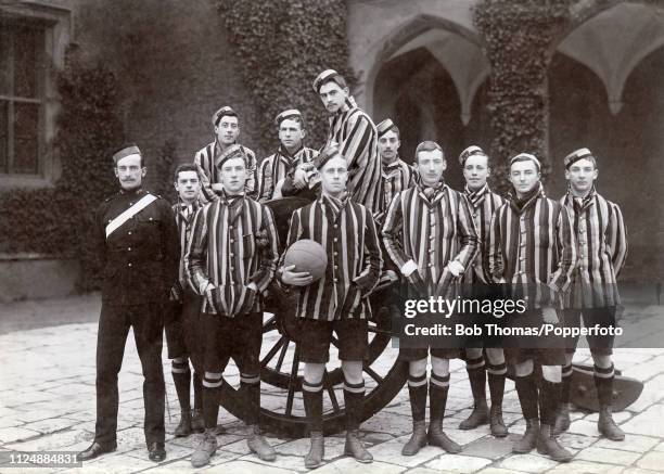 Royal Military Academy First XI football team and their coach at Woolwich in England, circa 1897.