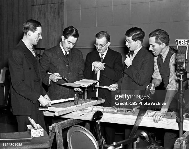 Members of CBS Radios' Columbia Workshop sound effects including figure 1 unidentified; William N. Robson, director; figure 3 unidentified; Bernard...