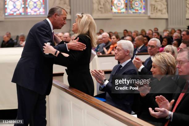 Former House Speaker John Boehner hugs Rep. Debbie Dingell, D-Mich., during funeral services for her husband, former Rep. John Dingell, Thursday,...