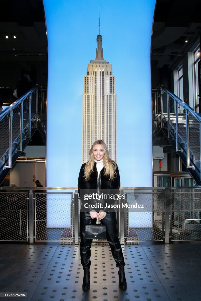 Model Camille Kostek Visits Empire State Building