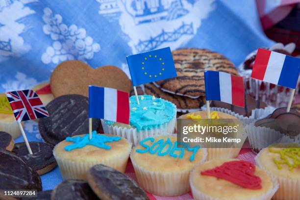 Cake not hate stall giving out cakes as Anti Brexit pro Europe demonstrators protest in Westminster opposite Parliament as MPs debate and vote on...