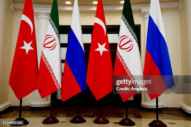 National flags of Turkey, Russia and Iran are pictured during the trilateral summit to discuss progress on Syria, between the Presidents of Turkey,...