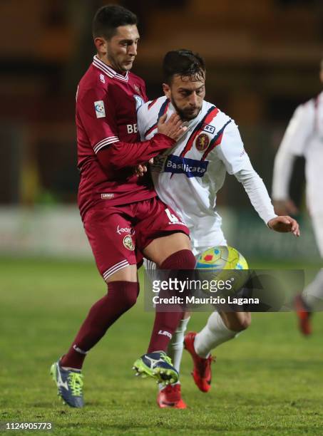 Francesco Salandria of Reggina competes for the ball with Antonio Bacio Terracino during the Lega Pro Serie C match between Reggina and Potenza at...